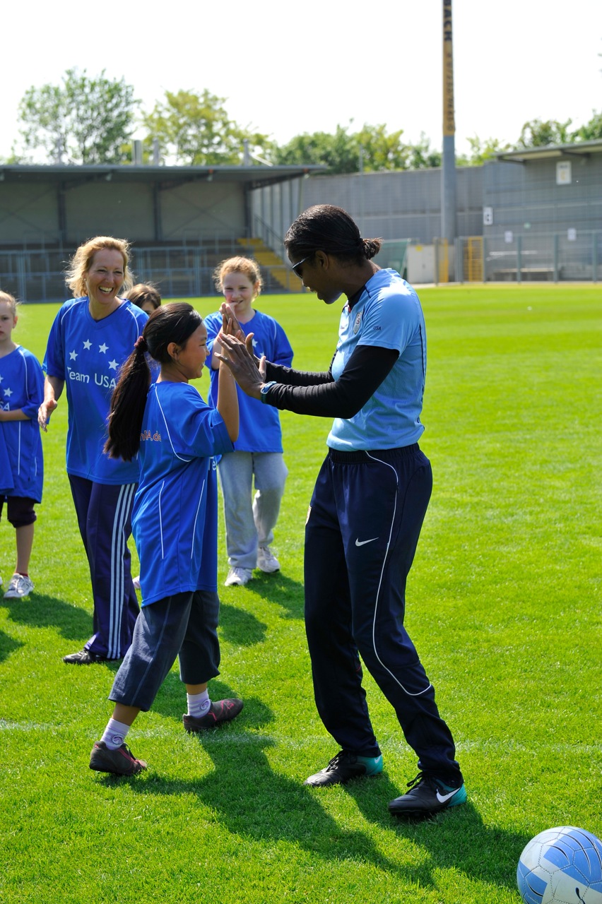Briana Scurry works with youth in Germany, 2011